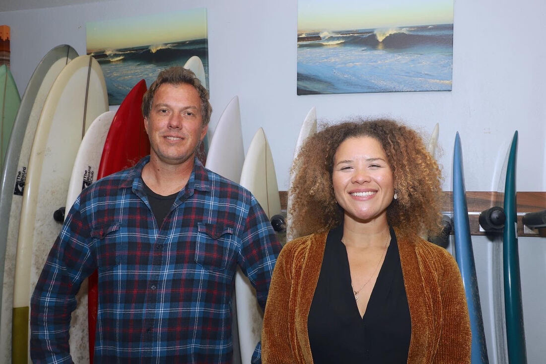 Community members at surf shop event