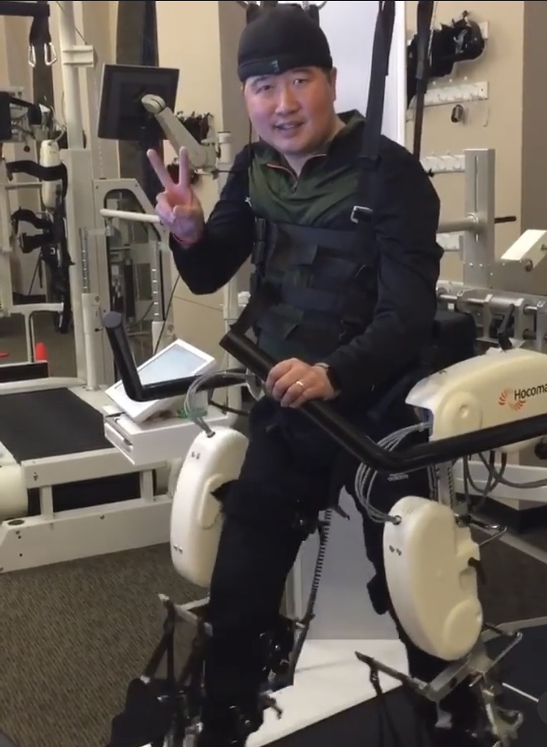 Patient using Hocoma robotic rehabilitation equipment